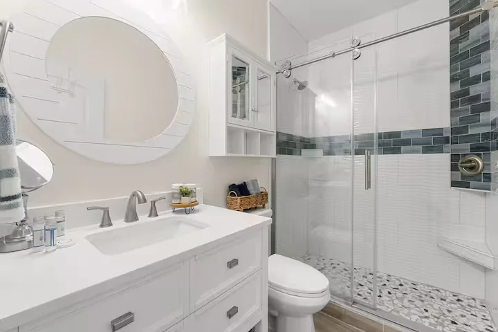 Bathroom vanity and glass shower