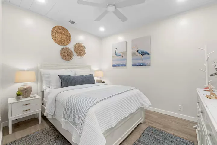 Furnished bedroom with coastal colors