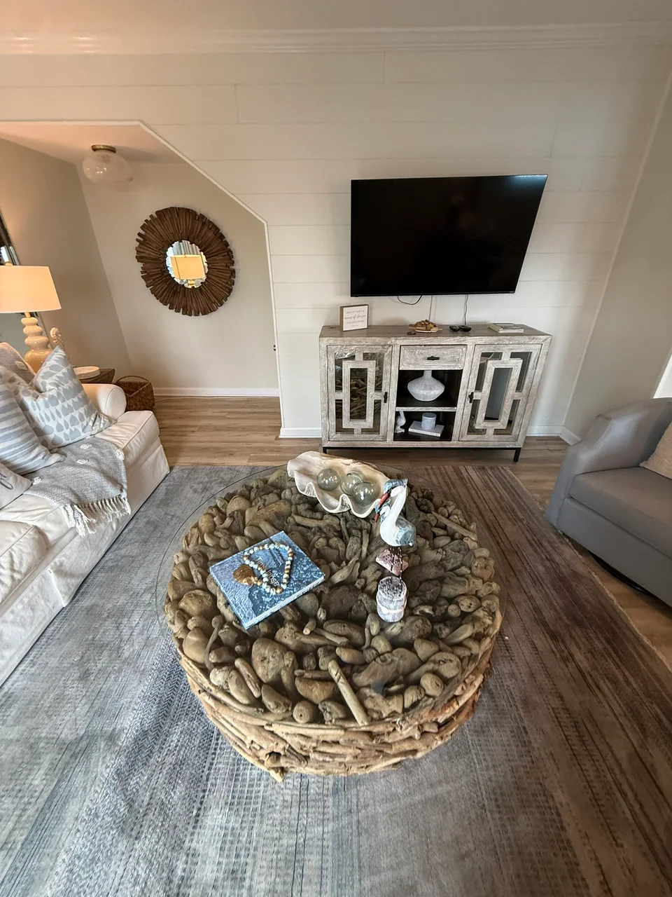 Reverse view of the furnished lounge and television area